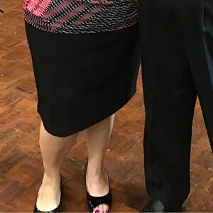 roz & ali- size 1X- knee length black skirt. So comfortable and flattering.